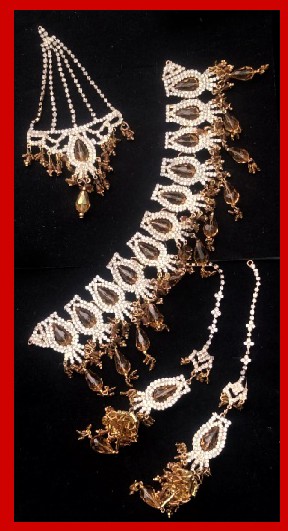 Imitation Jewellery no 24 golden and brown crystal necklace with earrings and jhomer
